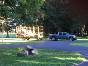 Hay wagon pulls into the driveway.