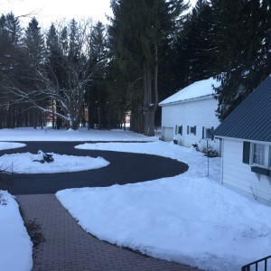 Snow in the front yard in April.